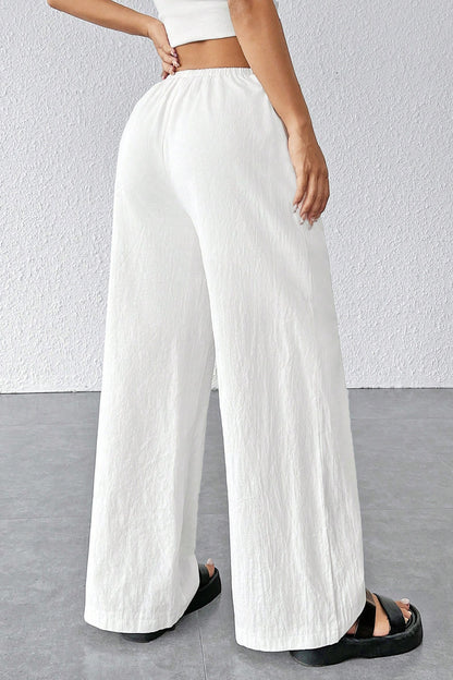 Kadın Beyaz Bol Kesim Cepli Geniş Paça Dökümlü Pantolon