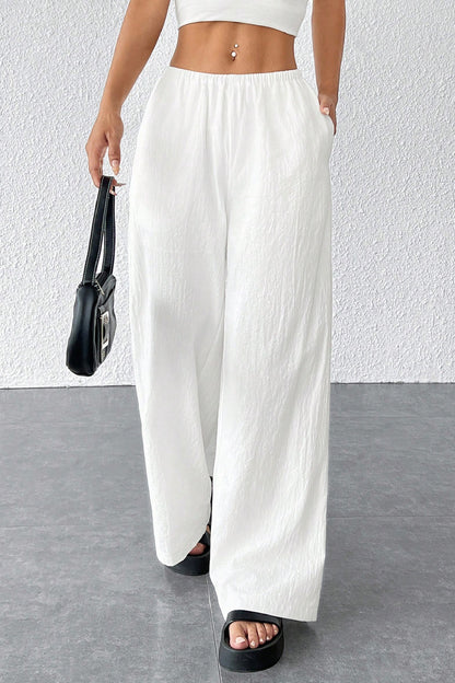 Kadın Beyaz Bol Kesim Cepli Geniş Paça Dökümlü Pantolon